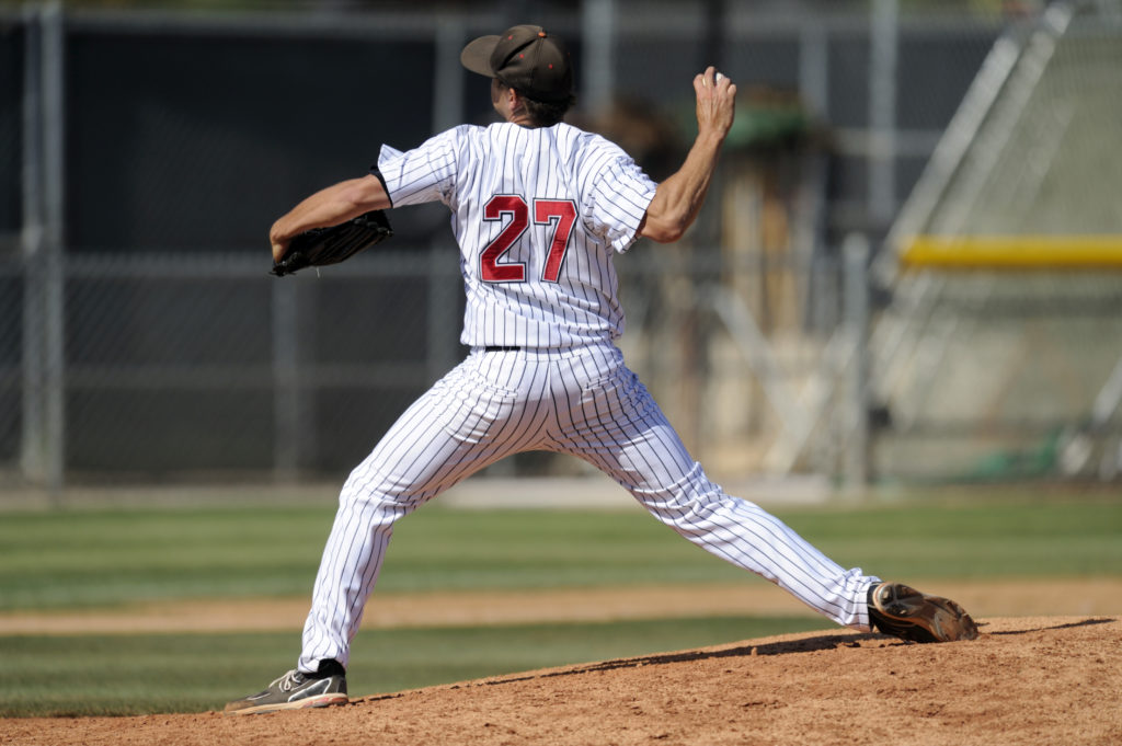 How do you prevent arm injuries in baseball?